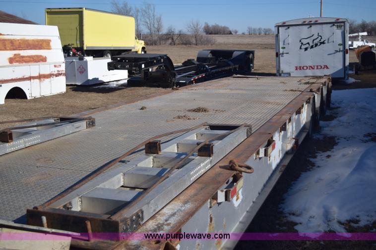 image for item E6069 2000 shop built triple axle lowboy trailer