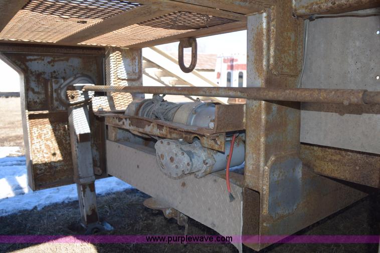 image for item E6069 2000 shop built triple axle lowboy trailer