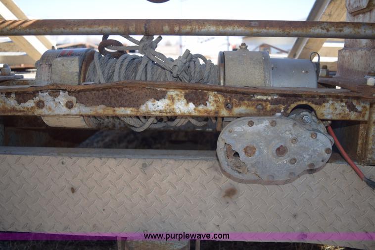 image for item E6069 2000 shop built triple axle lowboy trailer