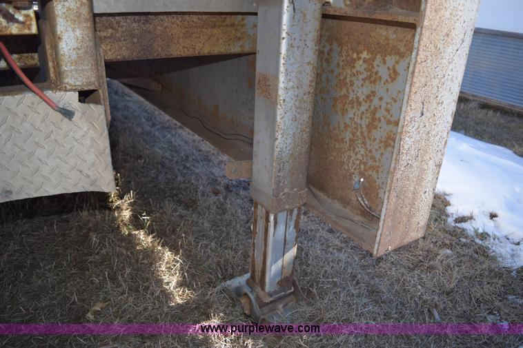 image for item E6069 2000 shop built triple axle lowboy trailer