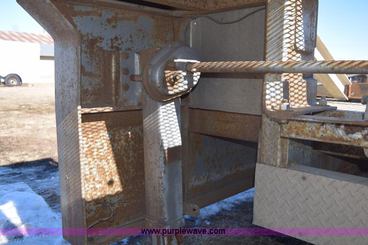 image for item E6069 2000 shop built triple axle lowboy trailer