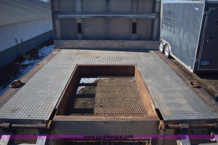 image for item E6069 2000 shop built triple axle lowboy trailer