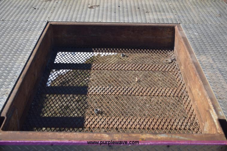 image for item E6069 2000 shop built triple axle lowboy trailer