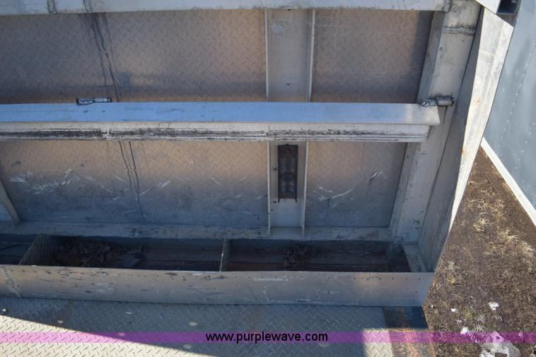 image for item E6069 2000 shop built triple axle lowboy trailer