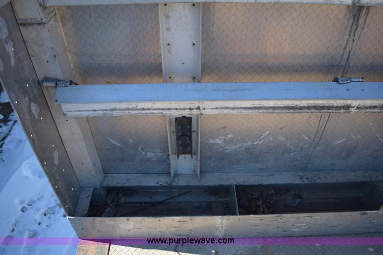 image for item E6069 2000 shop built triple axle lowboy trailer