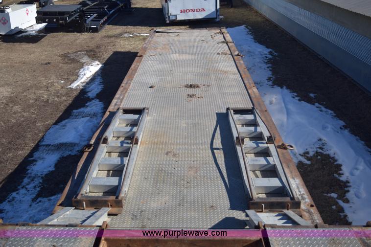 image for item E6069 2000 shop built triple axle lowboy trailer