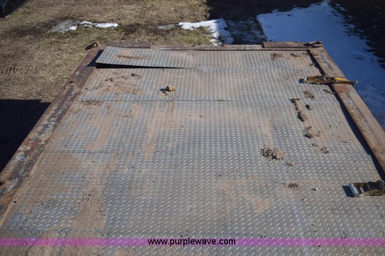 image for item E6069 2000 shop built triple axle lowboy trailer