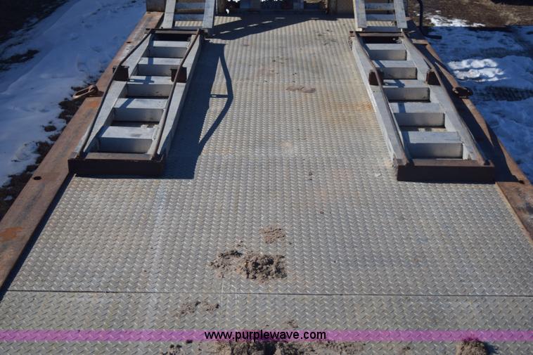 image for item E6069 2000 shop built triple axle lowboy trailer