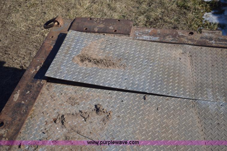 image for item E6069 2000 shop built triple axle lowboy trailer