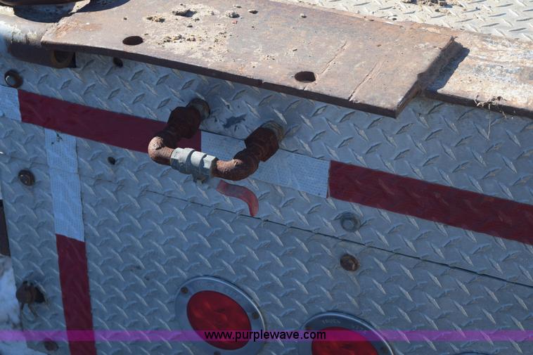 image for item E6069 2000 shop built triple axle lowboy trailer