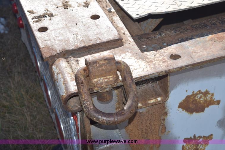 image for item E6069 2000 shop built triple axle lowboy trailer