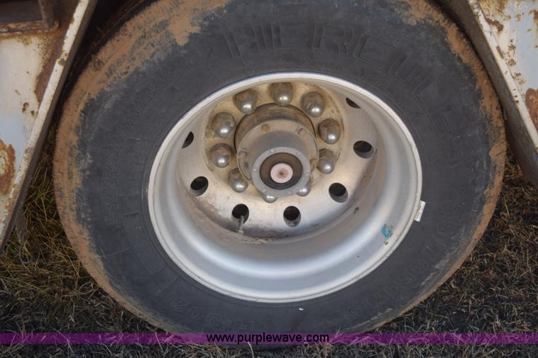 image for item E6069 2000 shop built triple axle lowboy trailer