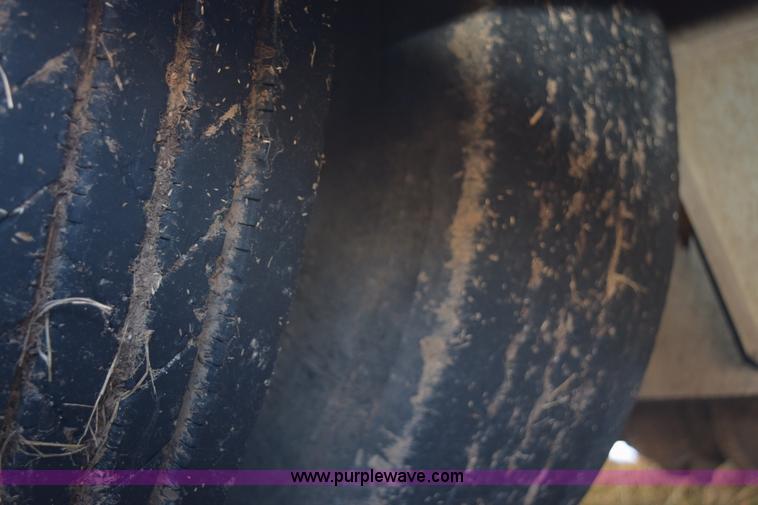 image for item E6069 2000 shop built triple axle lowboy trailer