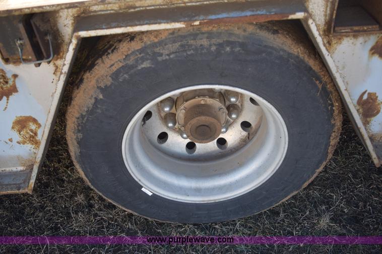 image for item E6069 2000 shop built triple axle lowboy trailer