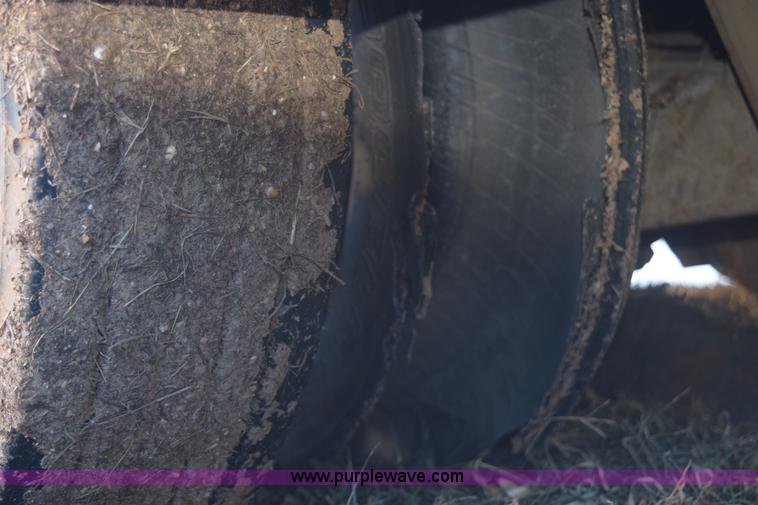 image for item E6069 2000 shop built triple axle lowboy trailer