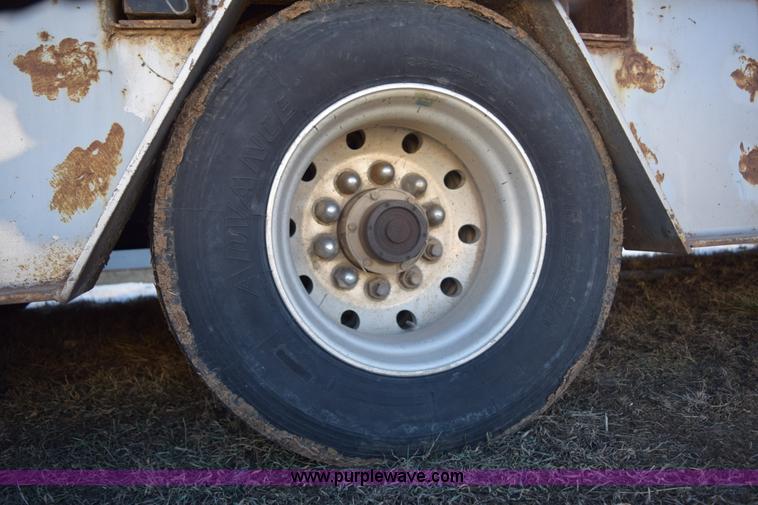 image for item E6069 2000 shop built triple axle lowboy trailer