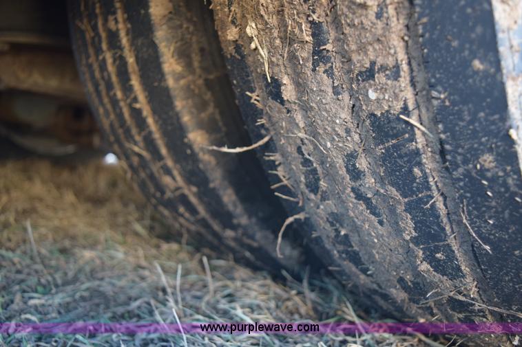 image for item E6069 2000 shop built triple axle lowboy trailer