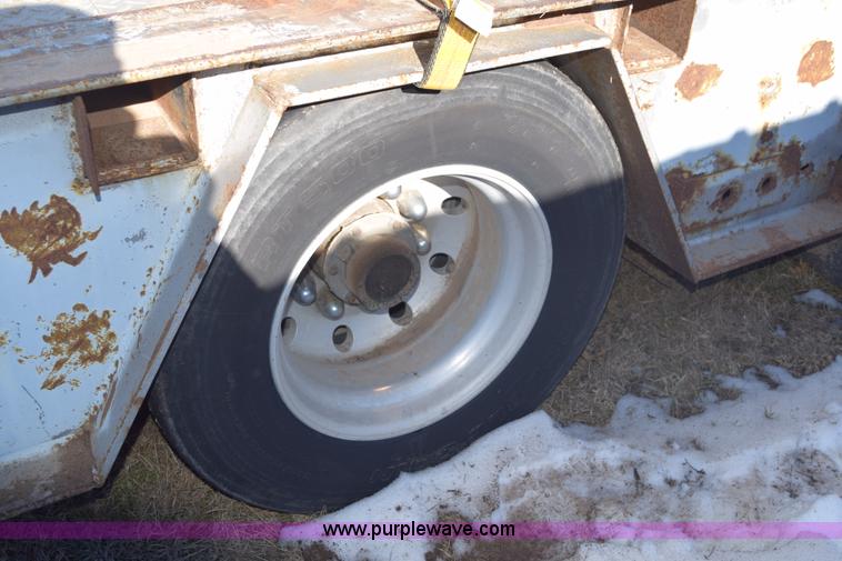 image for item E6069 2000 shop built triple axle lowboy trailer