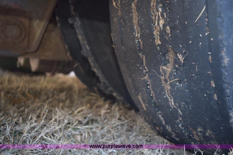 image for item E6069 2000 shop built triple axle lowboy trailer