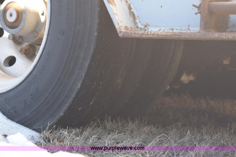 image for item E6069 2000 shop built triple axle lowboy trailer