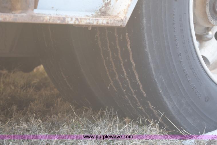 image for item E6069 2000 shop built triple axle lowboy trailer