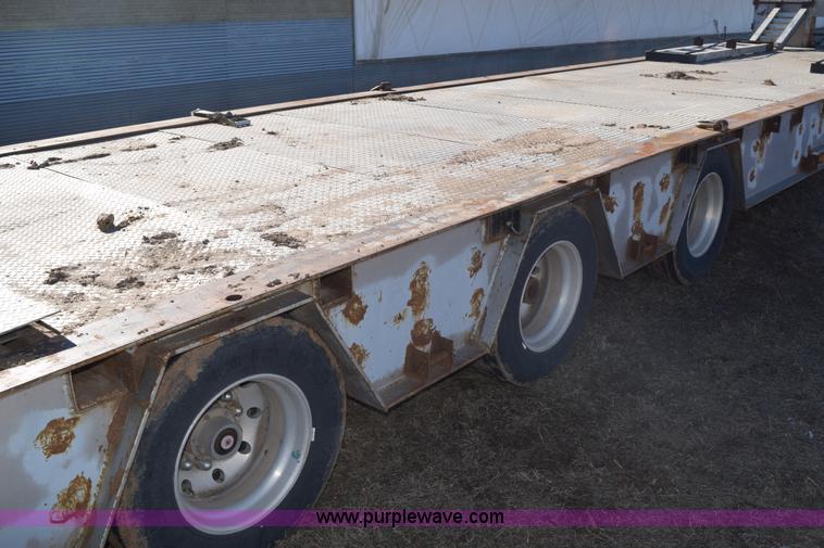 image for item E6069 2000 shop built triple axle lowboy trailer