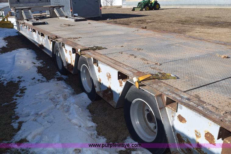 image for item E6069 2000 shop built triple axle lowboy trailer
