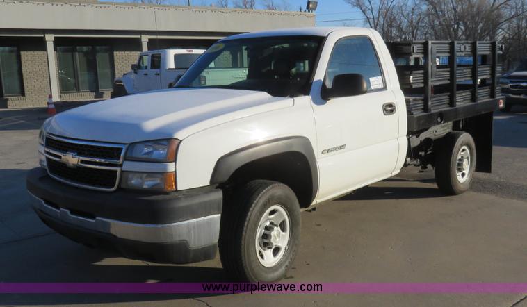 image for item I2407 2006 Chevrolet Silverado 2500HD flatbed pickup truck