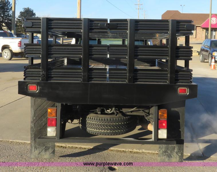 image for item I2407 2006 Chevrolet Silverado 2500HD flatbed pickup truck