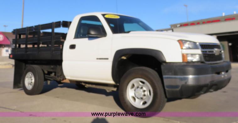 image for item I2407 2006 Chevrolet Silverado 2500HD flatbed pickup truck