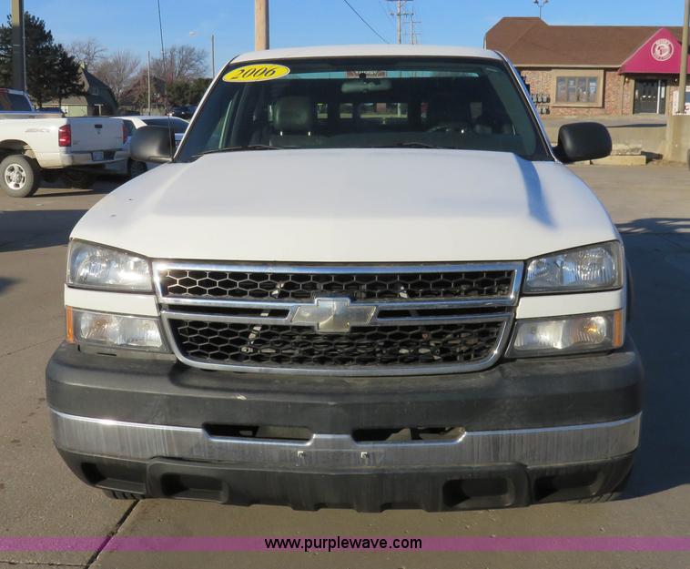 image for item I2407 2006 Chevrolet Silverado 2500HD flatbed pickup truck