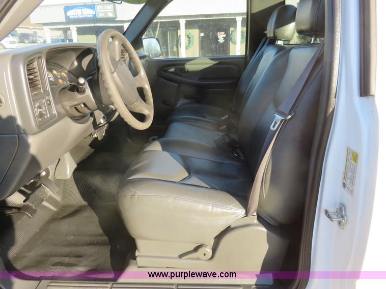 image for item I2407 2006 Chevrolet Silverado 2500HD flatbed pickup truck