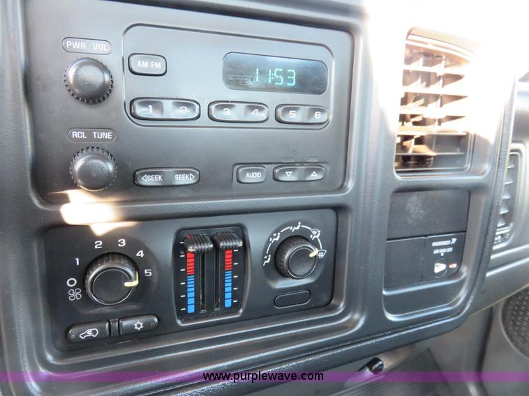 image for item I2407 2006 Chevrolet Silverado 2500HD flatbed pickup truck