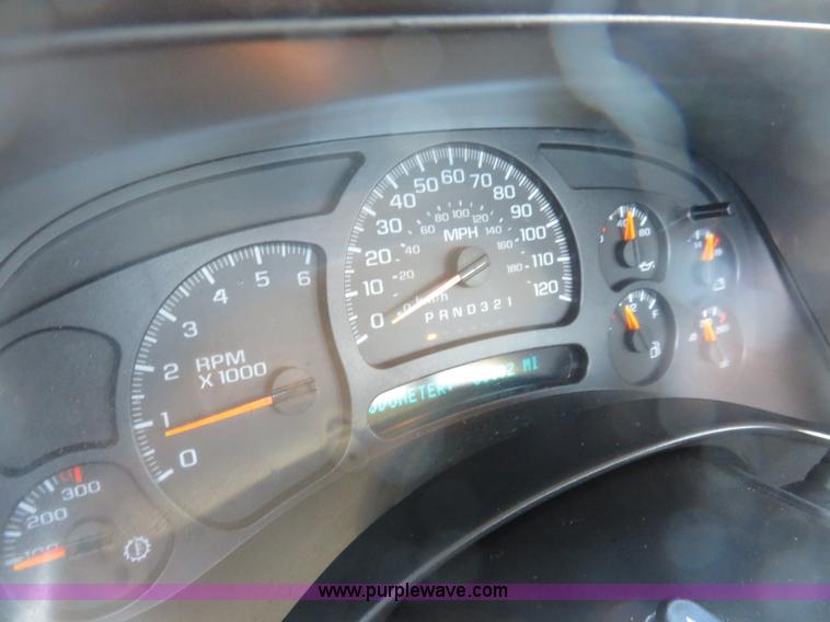 image for item I2407 2006 Chevrolet Silverado 2500HD flatbed pickup truck