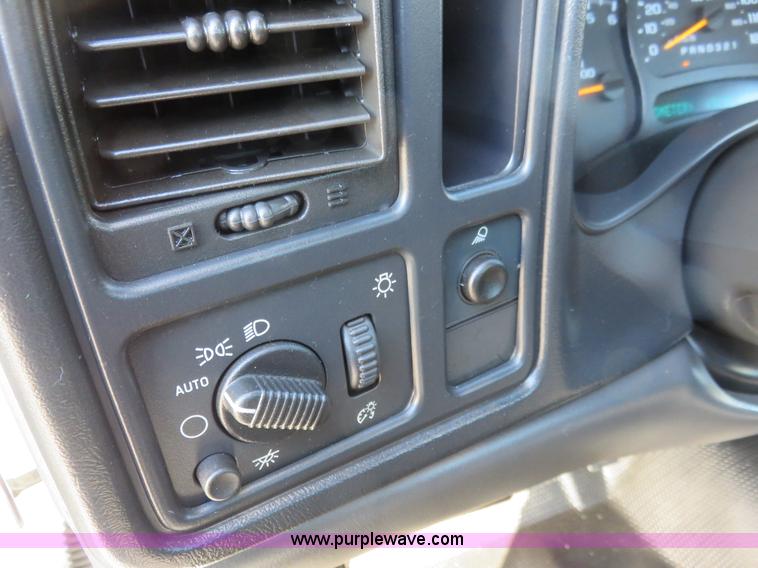 image for item I2407 2006 Chevrolet Silverado 2500HD flatbed pickup truck