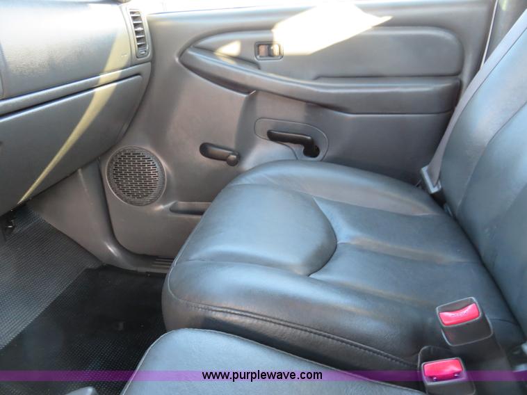 image for item I2407 2006 Chevrolet Silverado 2500HD flatbed pickup truck