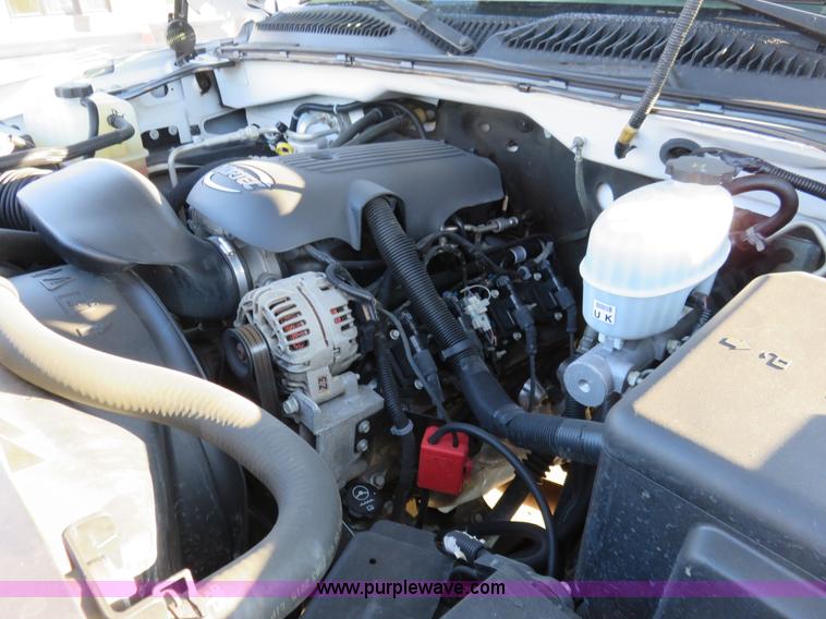 image for item I2407 2006 Chevrolet Silverado 2500HD flatbed pickup truck