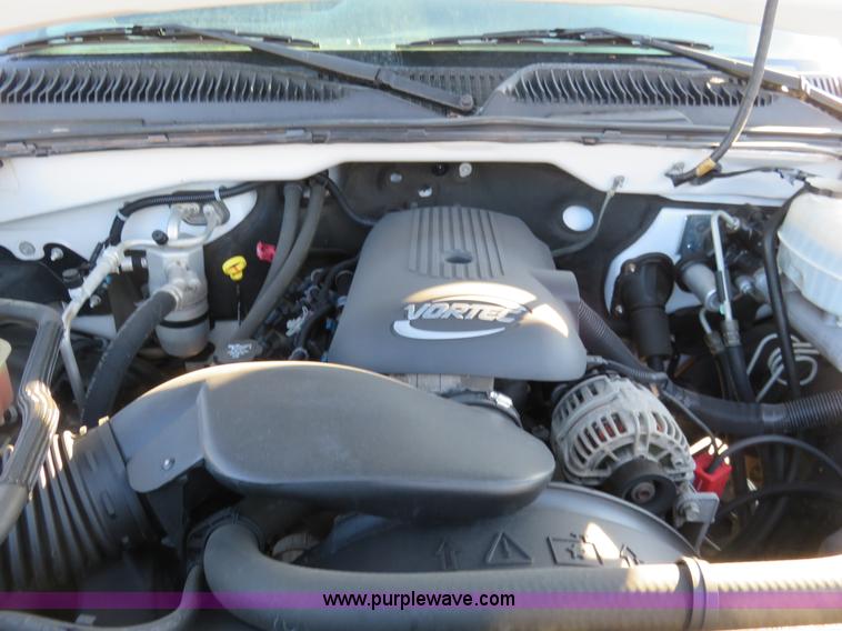 image for item I2407 2006 Chevrolet Silverado 2500HD flatbed pickup truck