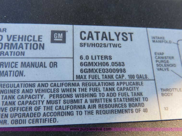 image for item I2407 2006 Chevrolet Silverado 2500HD flatbed pickup truck