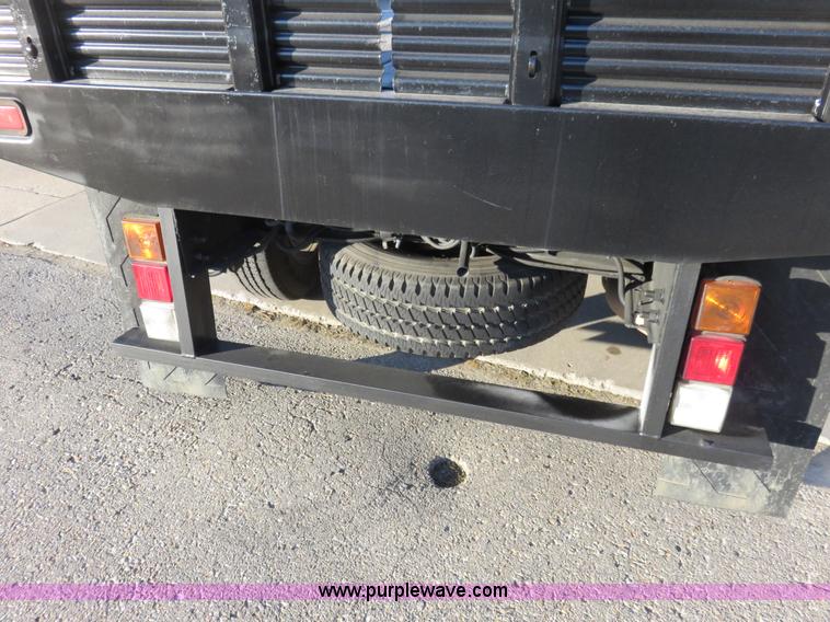 image for item I2407 2006 Chevrolet Silverado 2500HD flatbed pickup truck