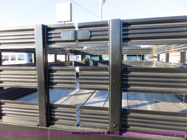 image for item I2407 2006 Chevrolet Silverado 2500HD flatbed pickup truck