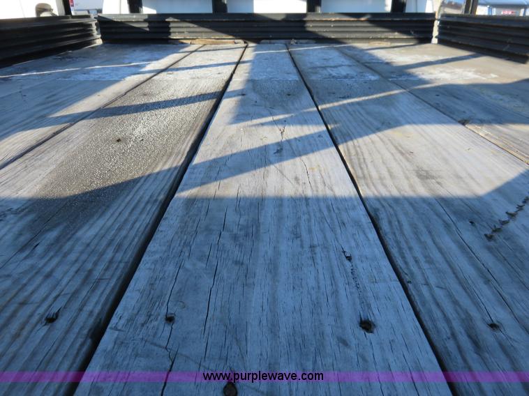 image for item I2407 2006 Chevrolet Silverado 2500HD flatbed pickup truck