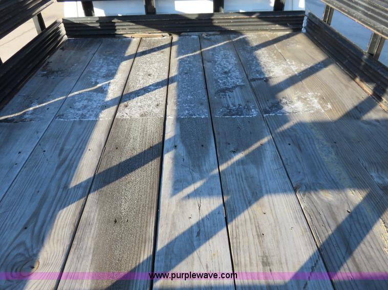 image for item I2407 2006 Chevrolet Silverado 2500HD flatbed pickup truck