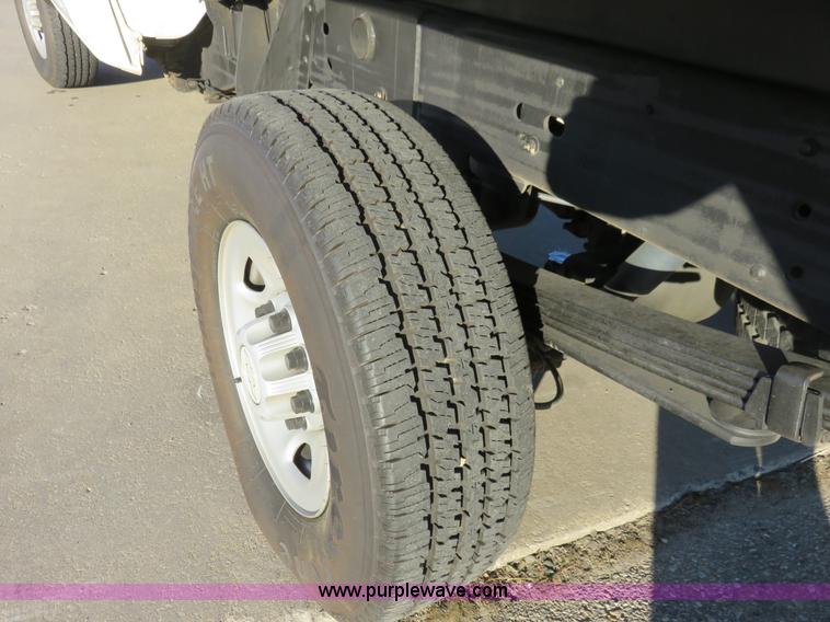 image for item I2407 2006 Chevrolet Silverado 2500HD flatbed pickup truck