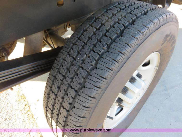 image for item I2407 2006 Chevrolet Silverado 2500HD flatbed pickup truck