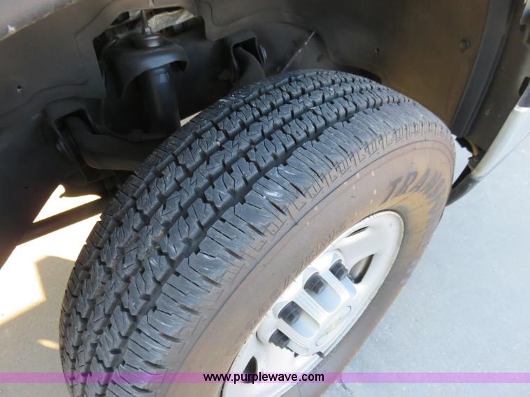 image for item I2407 2006 Chevrolet Silverado 2500HD flatbed pickup truck