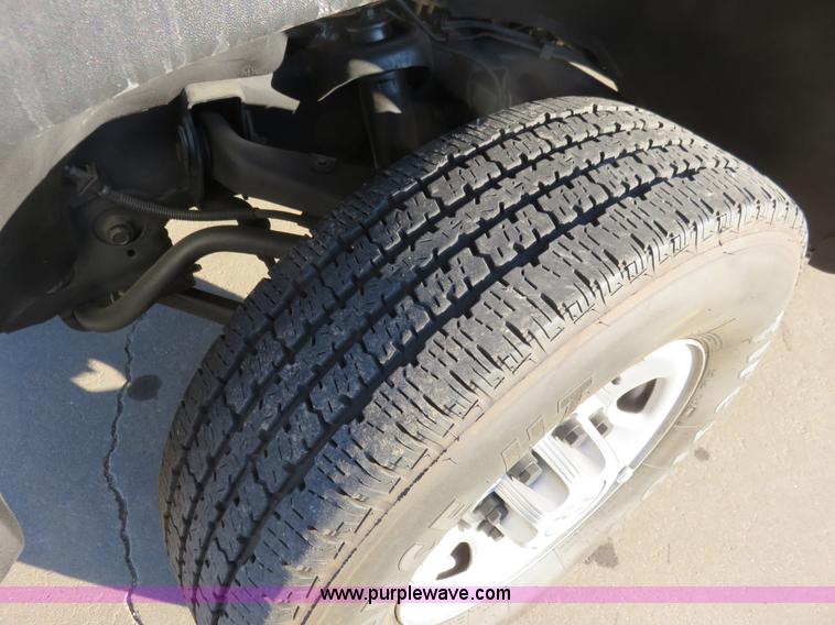 image for item I2407 2006 Chevrolet Silverado 2500HD flatbed pickup truck