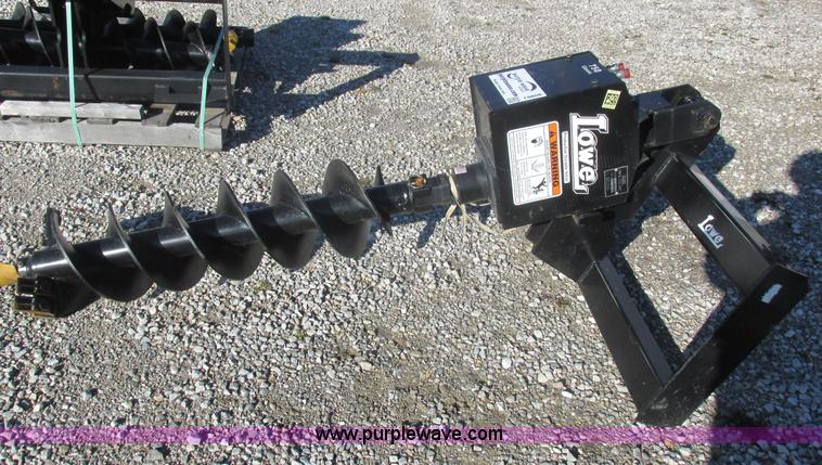 image for item I8808 Lowe 750CLH skid loader auger
