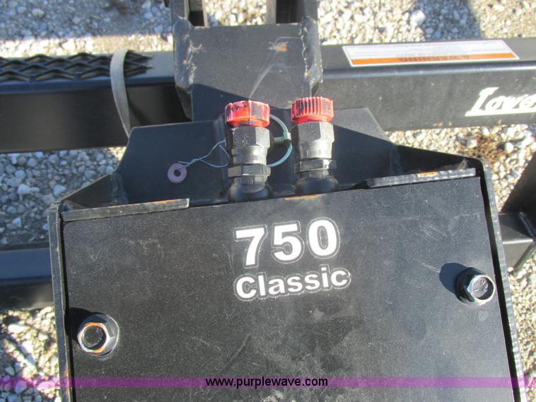 image for item I8808 Lowe 750CLH skid loader auger