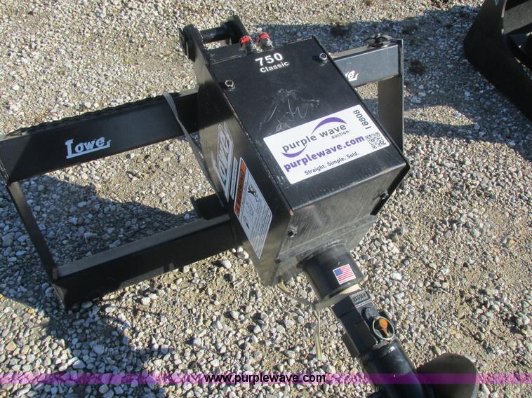 image for item I8808 Lowe 750CLH skid loader auger